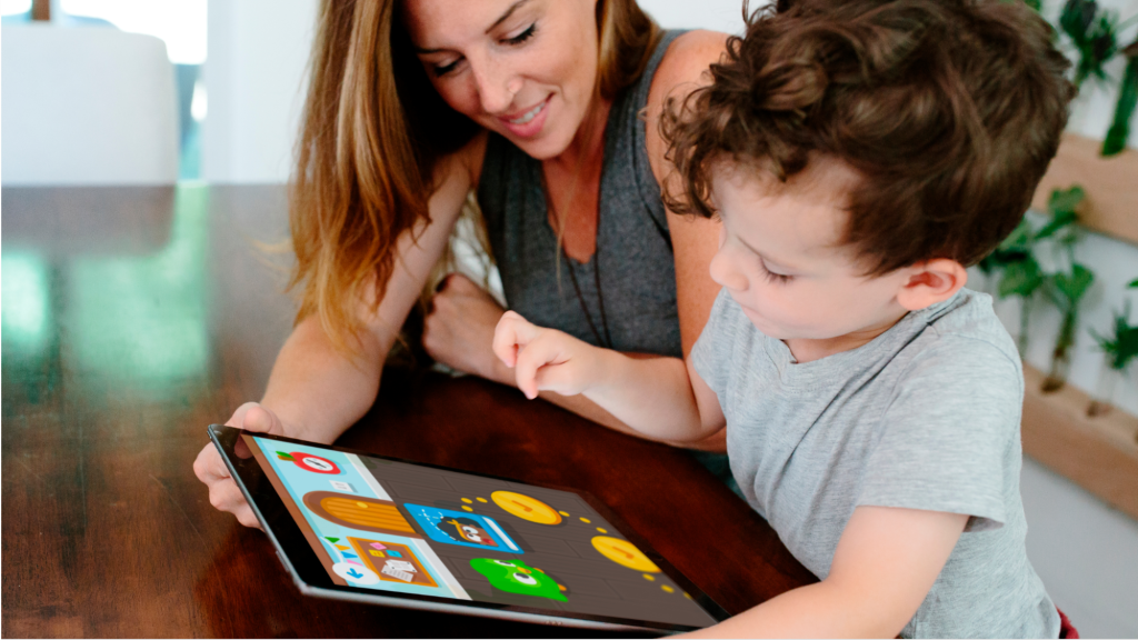 Mother and son playing app for early childhood education.